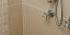 Beige Bathroom with Stone Feature